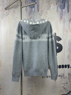 Gray zip-up hoodie back with Dior logo across chest and hood