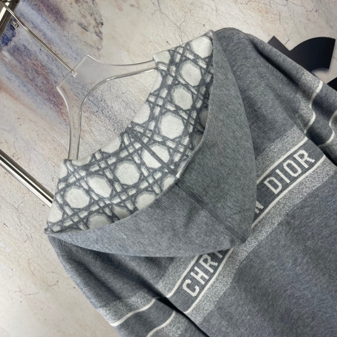Gray zip hoodie side detail with geometric print and DIOR trim