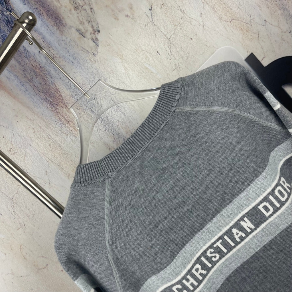 Long-sleeve gray crewneck sweater with Dior logo stripe along shoulder seam