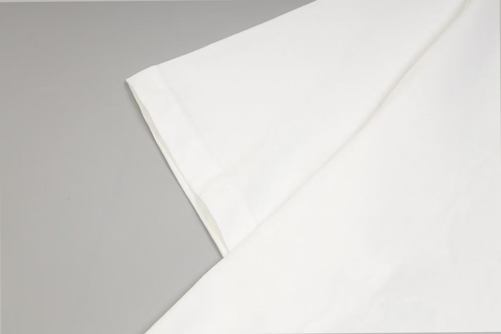 Givenchy white T-shirt fabric fold near sleeve and side seam