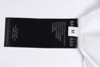 White T-shirt collar label detail with size info and BALENCIAGA