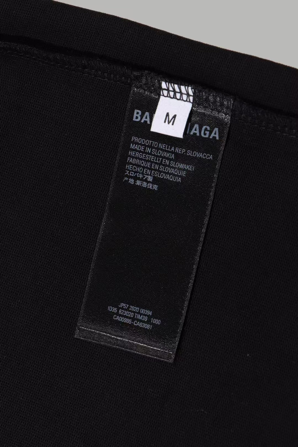 Black Balenciaga T-shirt inside care label and size tag detail
