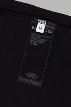 Black Balenciaga T-shirt inside care label and size tag detail