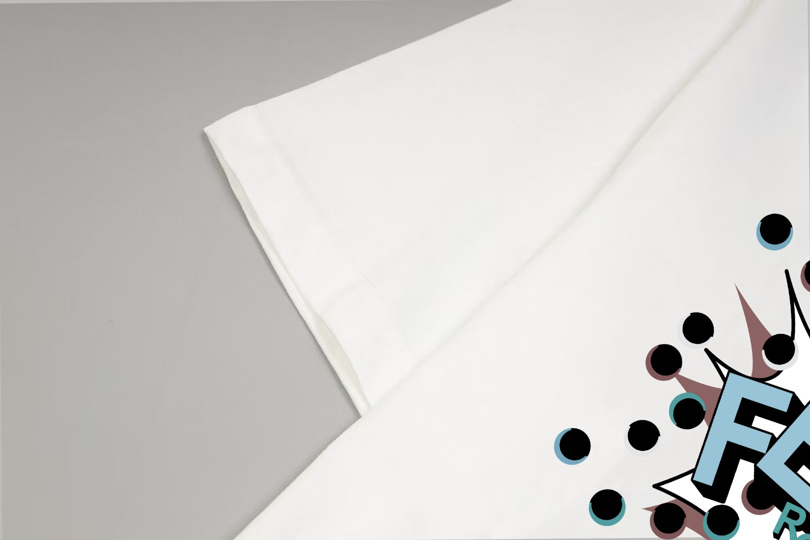 White T-shirt sleeve and shoulder with partial colorful logo graphic