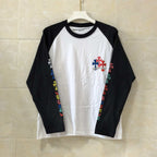 White long-sleeve raglan T-shirt with black sleeves and small cross flower print