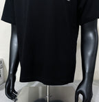 Black short-sleeve T-shirt on mannequin, front lower view