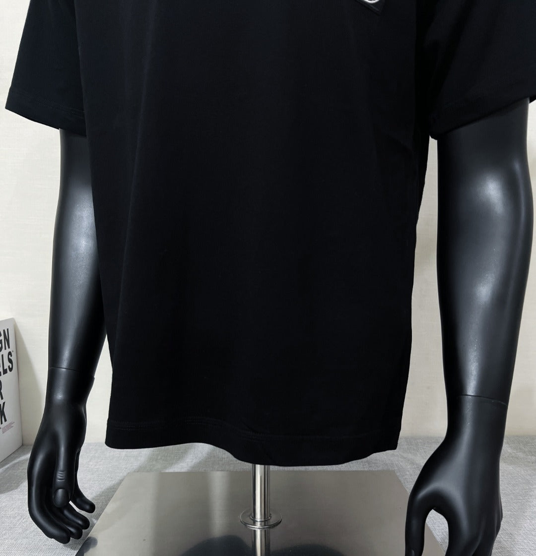 Black short-sleeve T-shirt on mannequin, front lower view