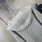 Dior zip hoodie laid flat, hood and patterned lining visible