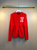 Red Louis Vuitton cardigan sweater with white logo heart and button front