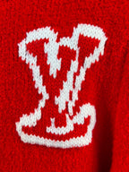Red knit cardigan with large white heart LV-style logo