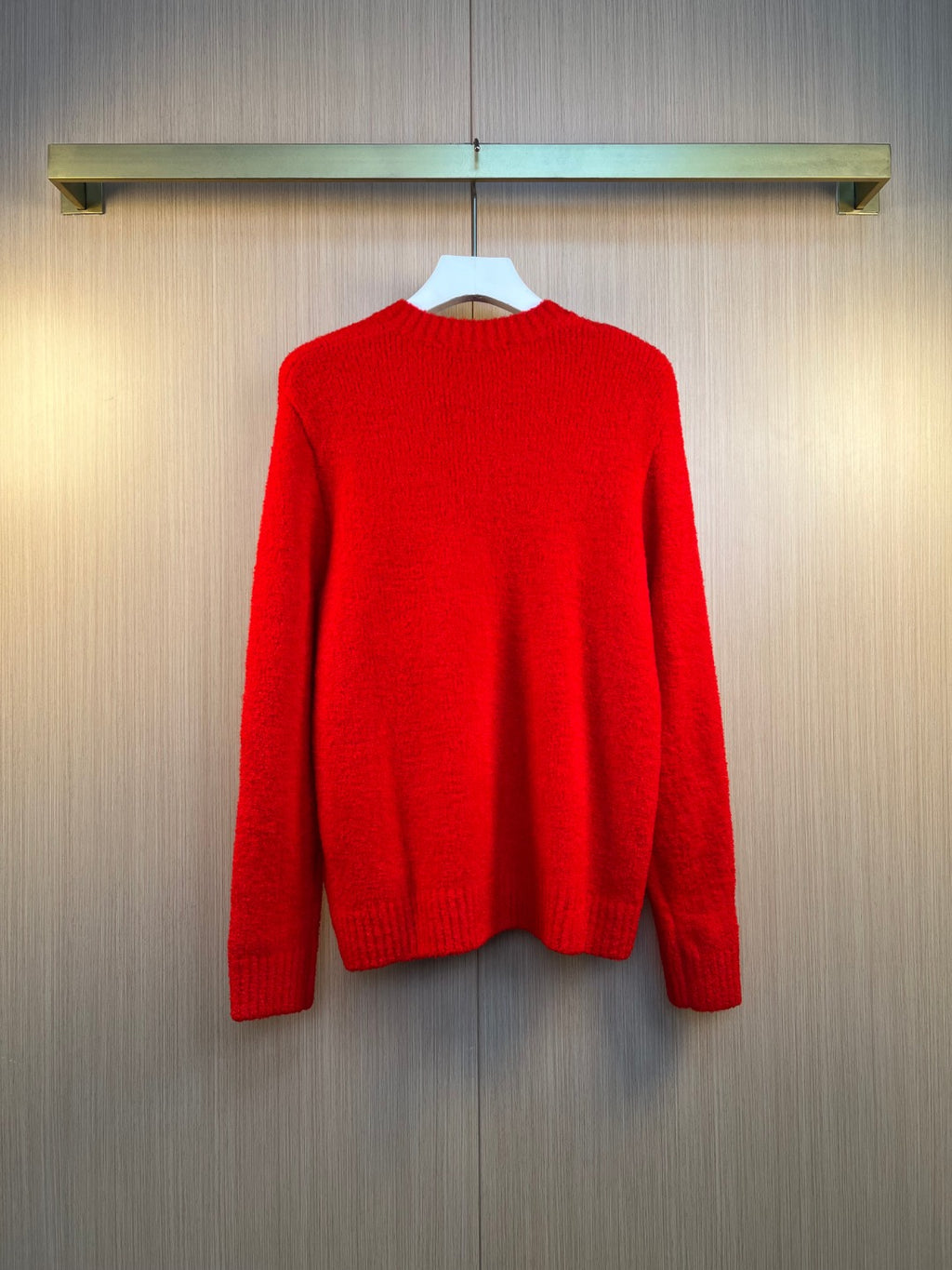 Red knit sweater cardigan back view with ribbed crew collar