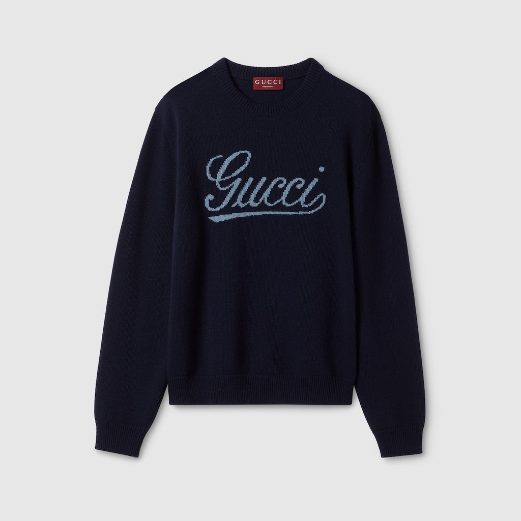 Gucci dark blue crewneck sweater with white script logo, long sleeves