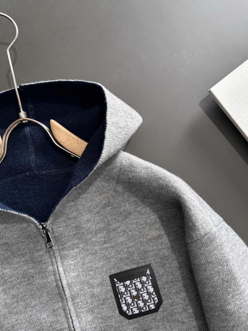 Dior long zip-up hoodie hood and front pocket detail in heather gray