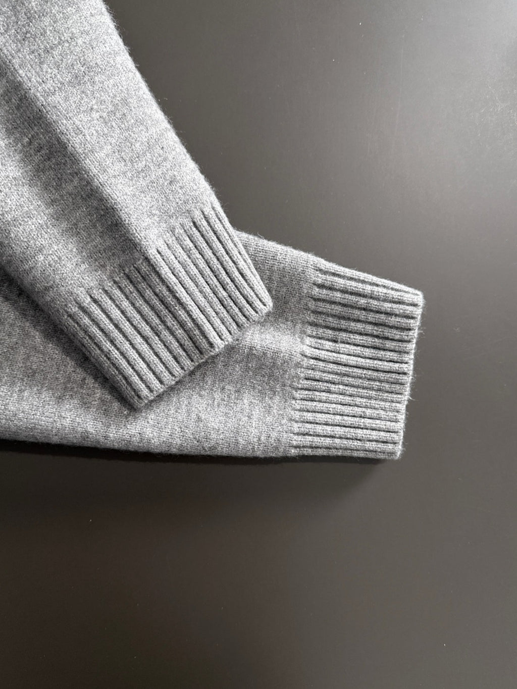 Dior long zip-up hoodie sleeve cuff and ribbed knit hem in heather gray