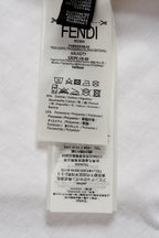 Fendi short care label tag on white fabric