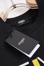 Fendi black crew-neck T-shirt with FENDI neck label and hanging size tag