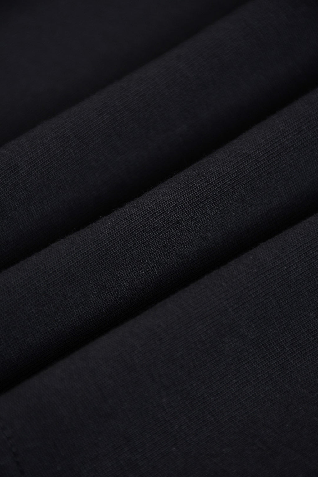 Dark fabric close-up of Fendi short-sleeve top