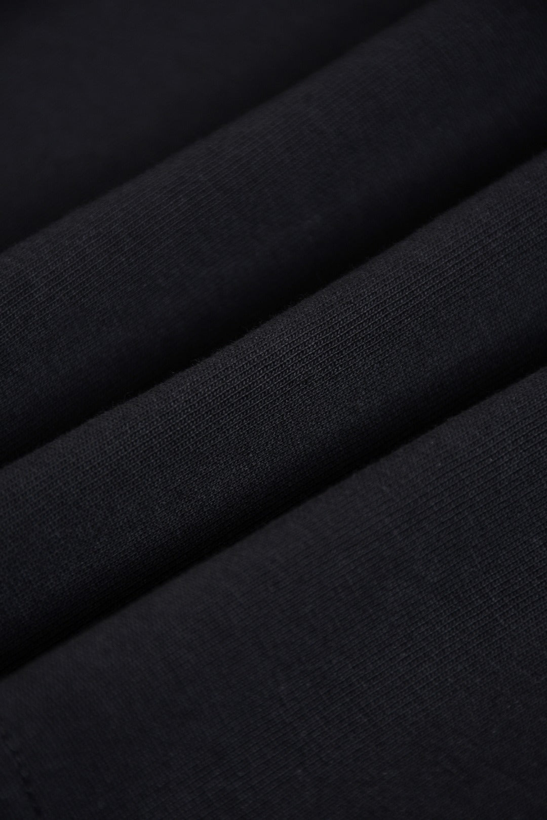 Dark fabric close-up of Fendi short-sleeve top