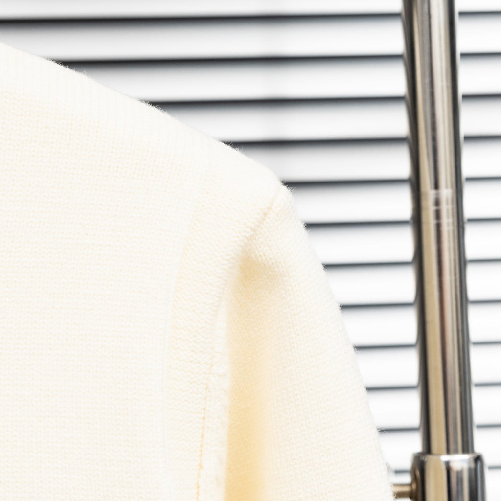 Stone Island cream knit cardigan sleeve cuff and shoulder seam detail