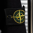 Black knit jacket cuff with embroidered Stone Island patch