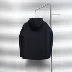 Stone Island hooded jacket in dark color, back view with hood and short center seam