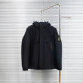 Stone Island hooded jacket in dark color, front view with buttoned closure and pockets