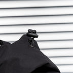 Stone Island hood detail with black toggle and front fabric seam