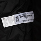 Stone Island black jacket fabric with size and care tags
