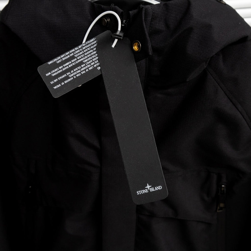 Stone Island black jacket collar with zip and logo badge