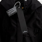 Stone Island black jacket collar with zip and logo badge