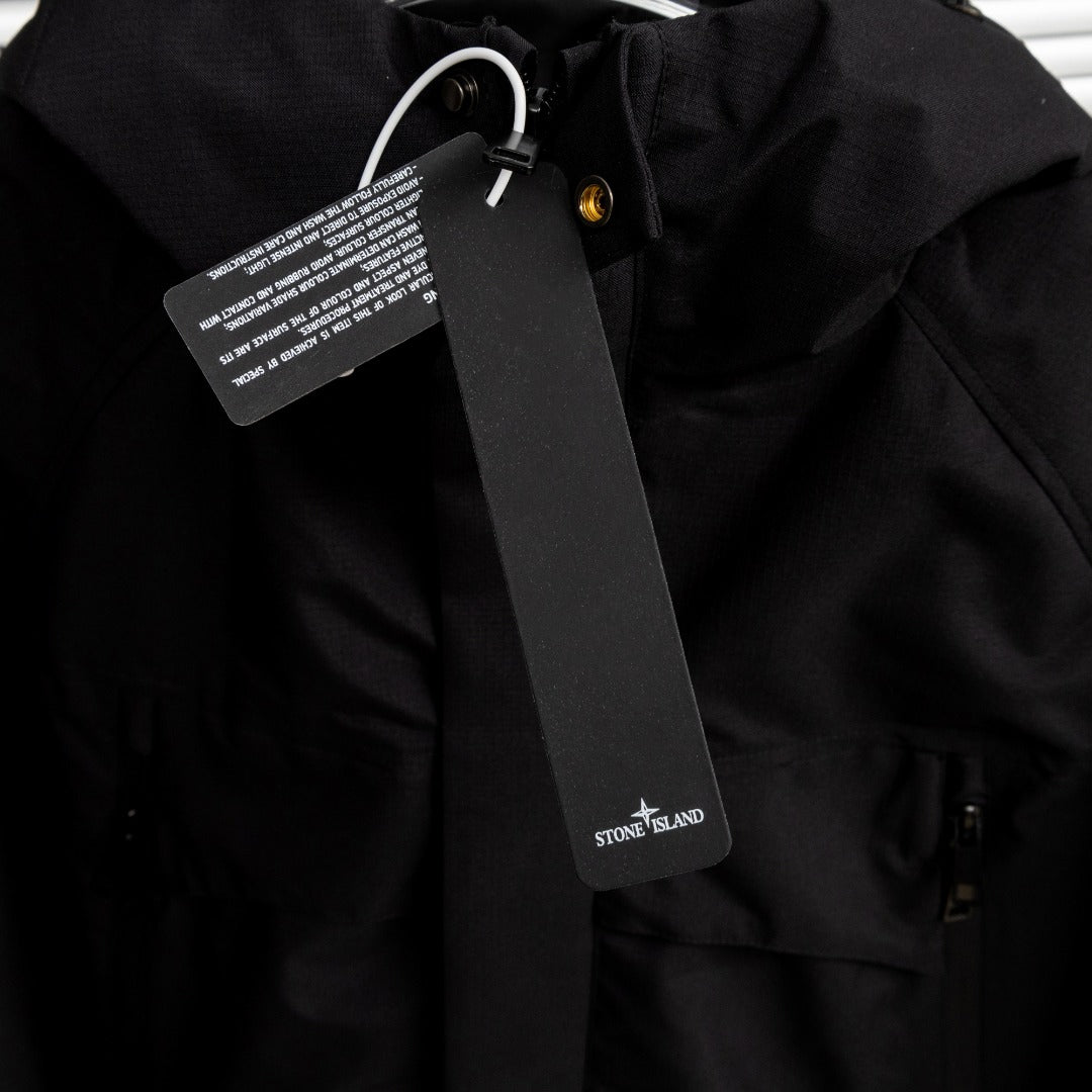 Stone Island black jacket collar with zip and logo badge