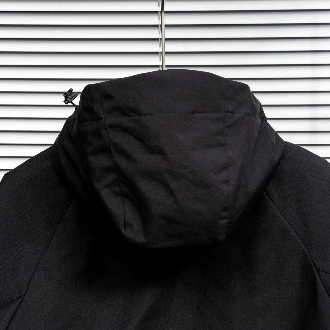 Stone Island black jacket back view with hood