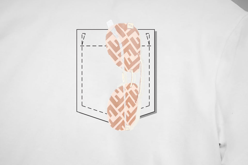 Chest logo graphic on white Fendi T-shirt in light peach and line art