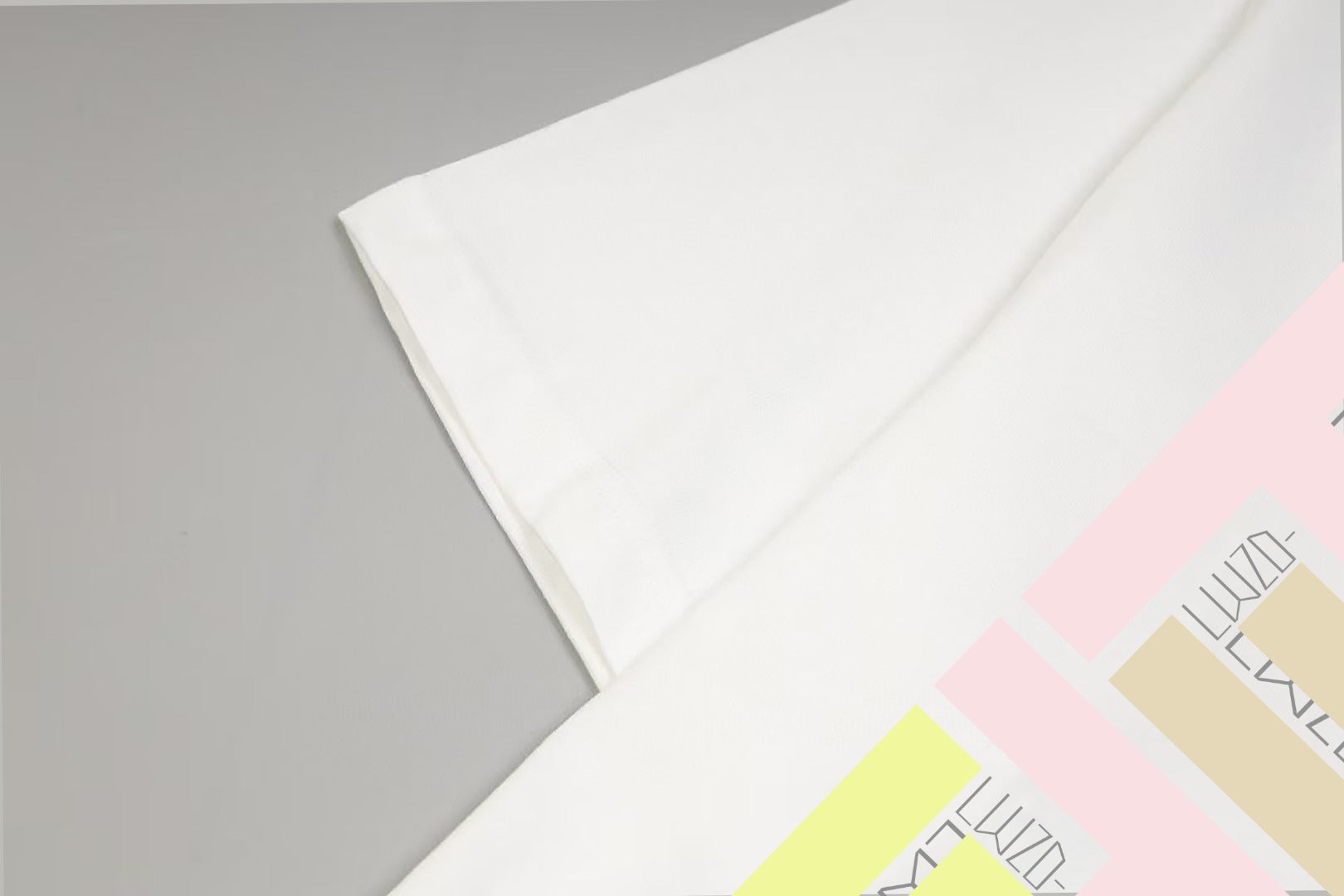 Fendi white T-shirt sleeve with partial multicolor logo print