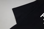 Black Fendi T-shirt sleeve and shoulder seam, angled view
