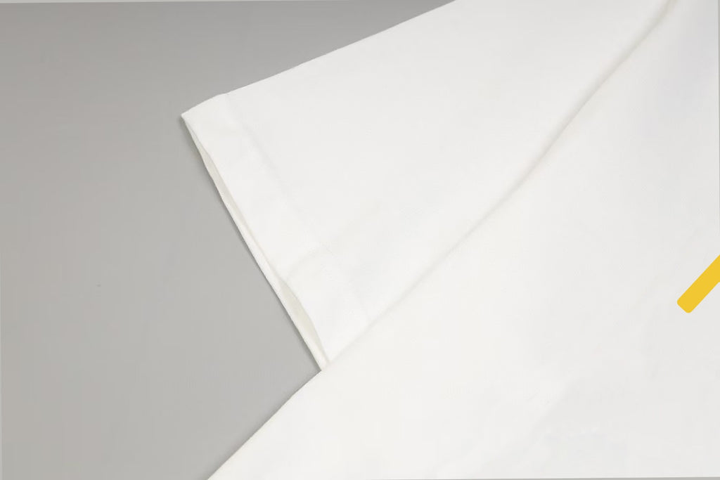White short-sleeve T-shirt sleeve and folded hem detail