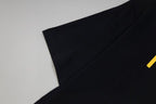 Black short-sleeve T-shirt shoulder and sleeve seam detail