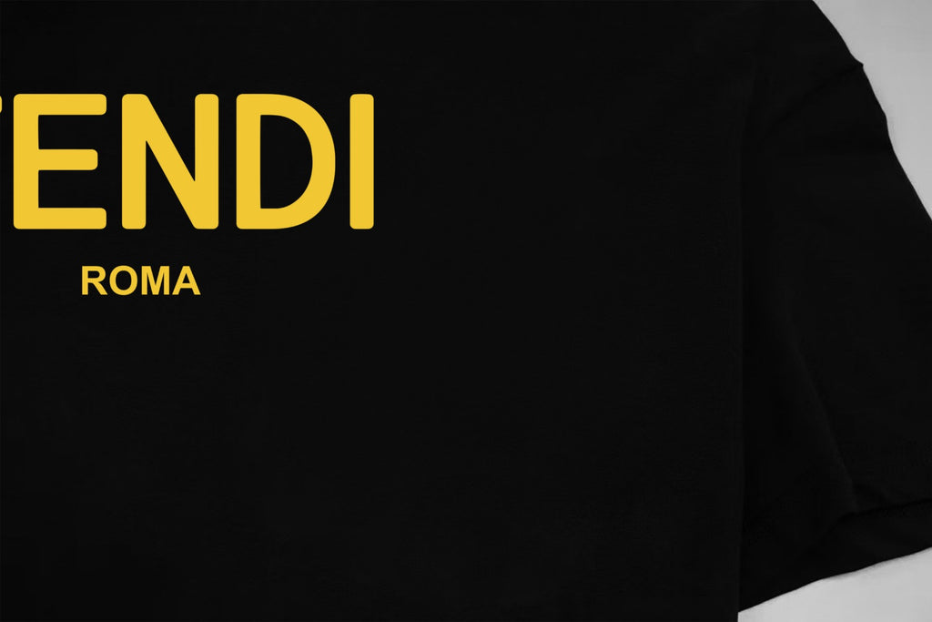 Black short-sleeve T-shirt front with large yellow FENDI ROMA logo