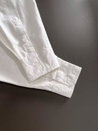 Dior long-sleeve shirt, white cuff with button detail