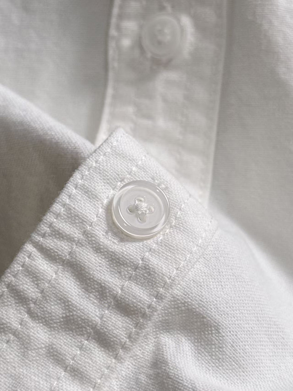 Dior long-sleeve shirt, white fabric with round button on the placket