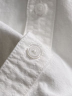 Dior long-sleeve shirt, white fabric with round button on the placket