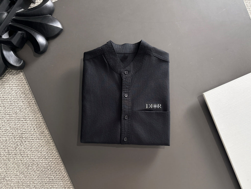 Dior long-sleeve button-up shirt, dark front with Dior logo and button placket