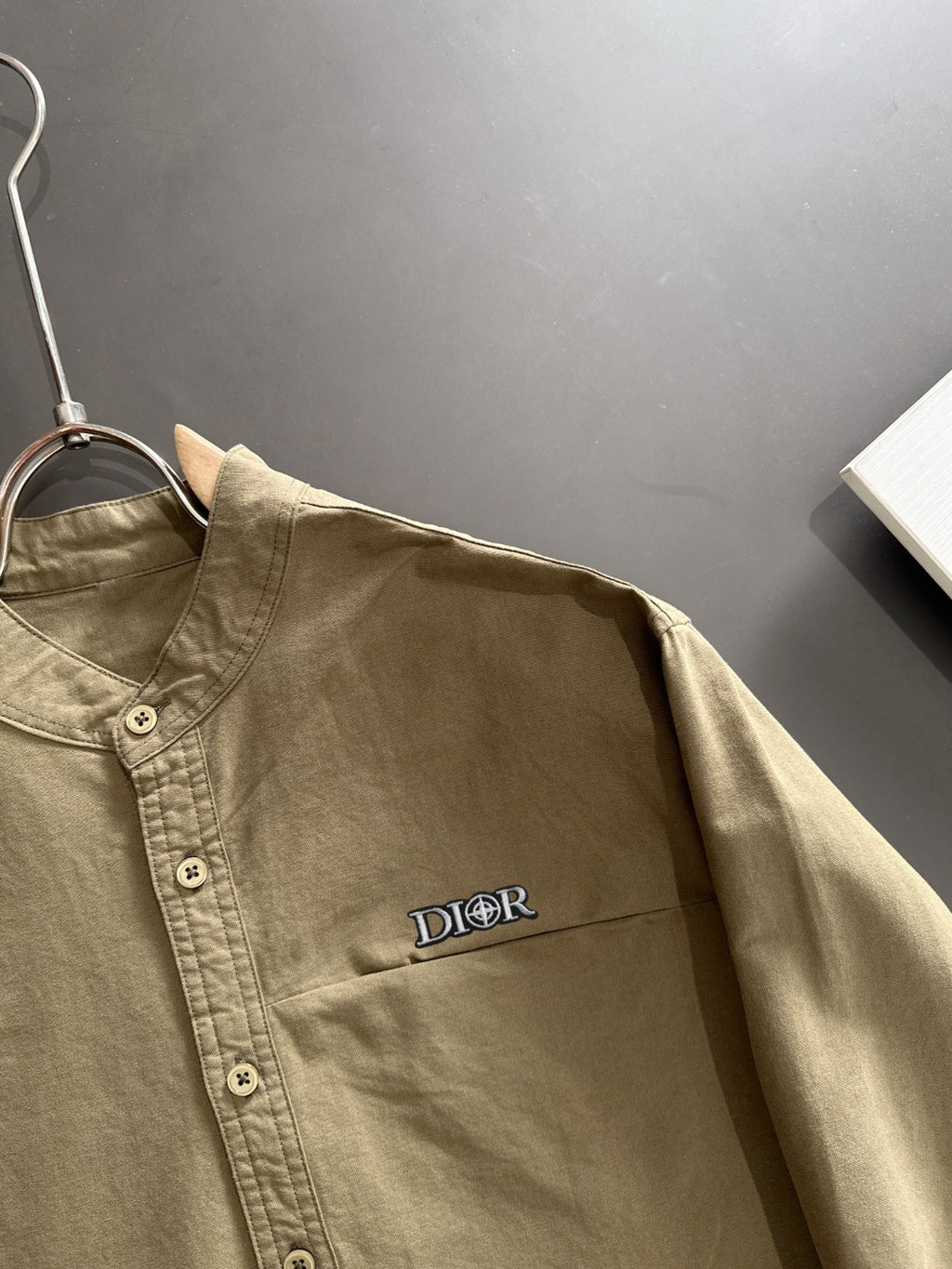 Long-sleeve shirt with Dior chest logo and button front, olive-brown.