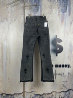 Dark gray denim pants with embroidered cross pattern, back view, straight leg