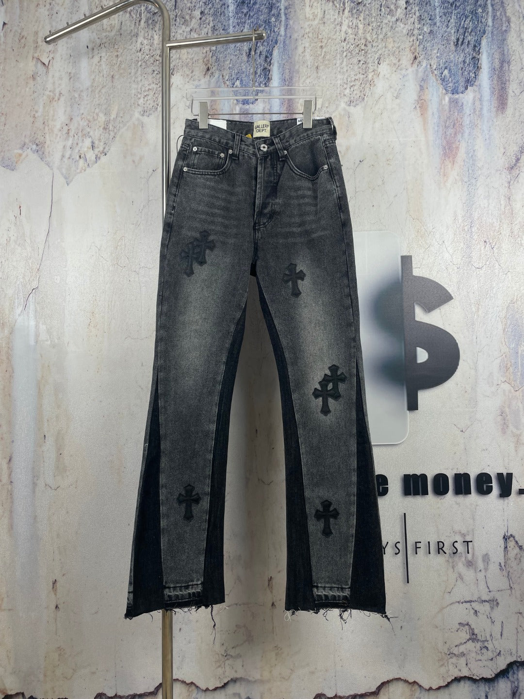 Dark gray denim pants with embroidered cross pattern, front view, straight leg