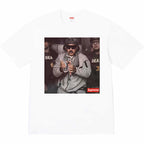 White graphic T-shirt with front photo print and Supreme label at bottom right
