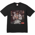 Black graphic T-shirt with front photo print and Supreme label at bottom right