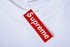 White T-shirt neckline tag reading Supreme