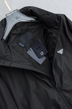 Prada long jacket interior lining with visible front zipper and dark shell