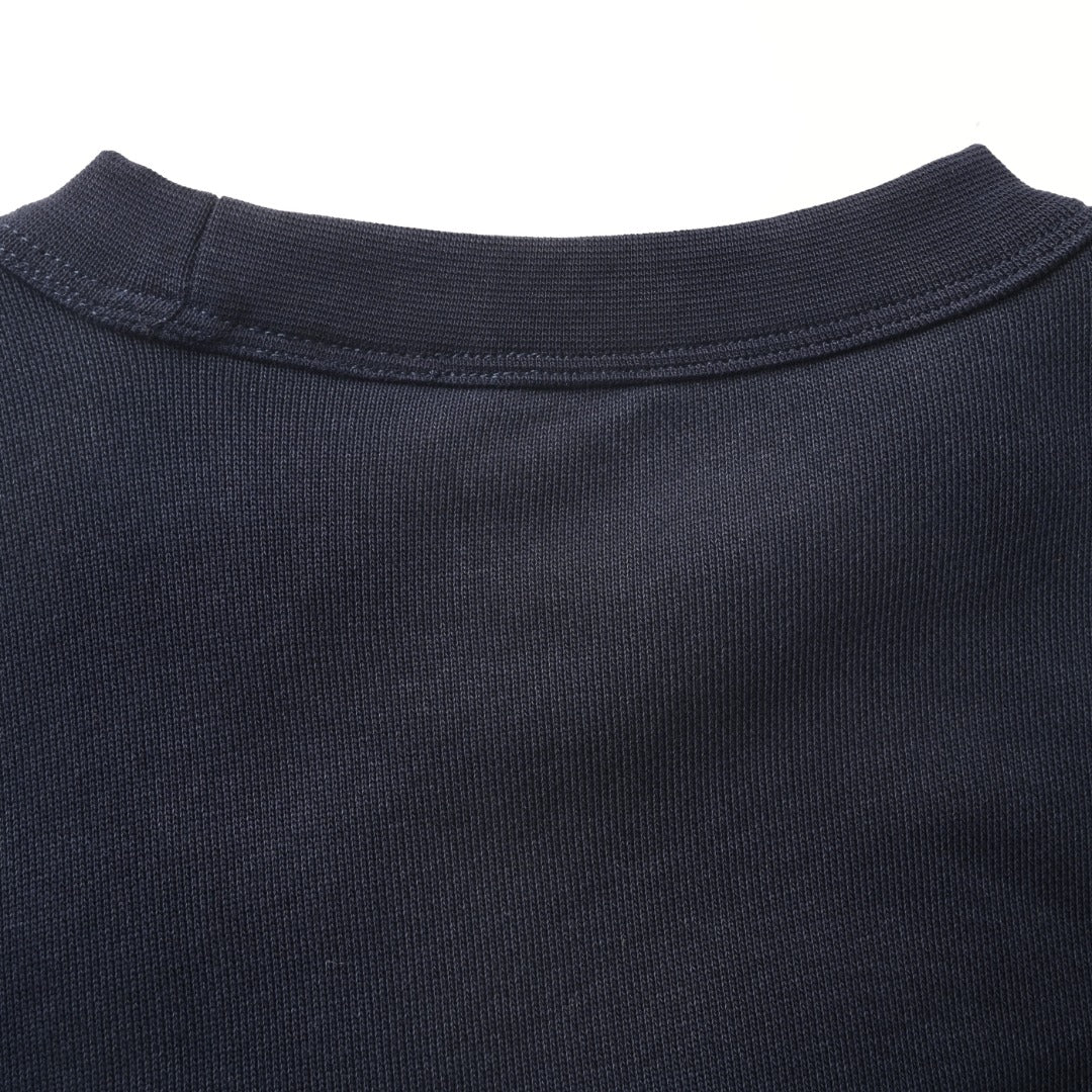 Dark navy crewneck collar with ribbed knit neckline